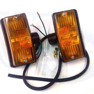PAIR OF OLYMPIA FRONT INDICATORS – BLACK BODY-AMBER LENS – VESPA PX